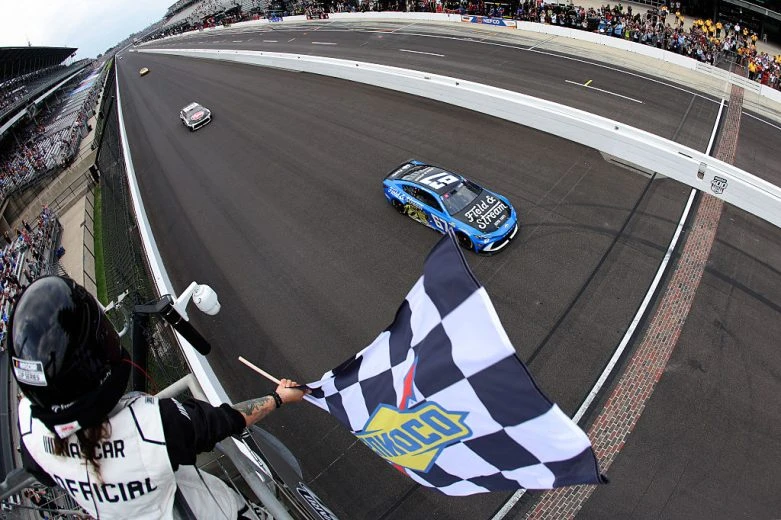 Corey Heim crosses the start finish line to win the 2026 Brickyard 400 at Indianapolis Motor Speedway