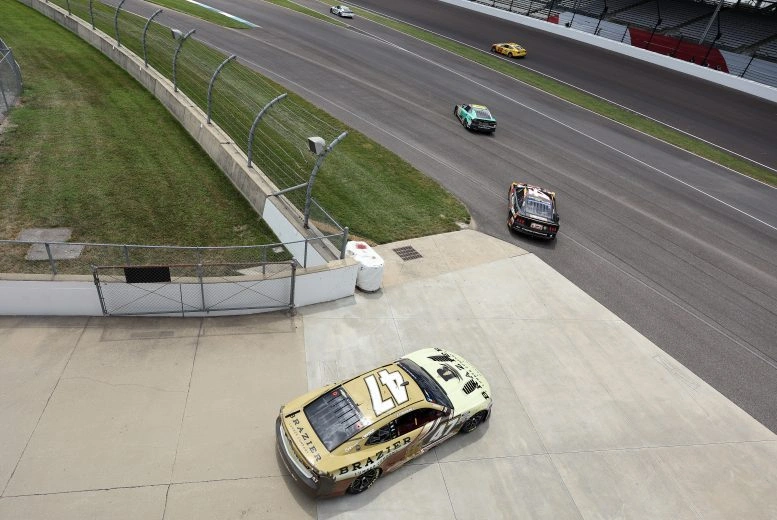 NASCAR Cup Series cars leave the garage for 2026 Brickyard 400 practice at Indianapolis Motor Speedway