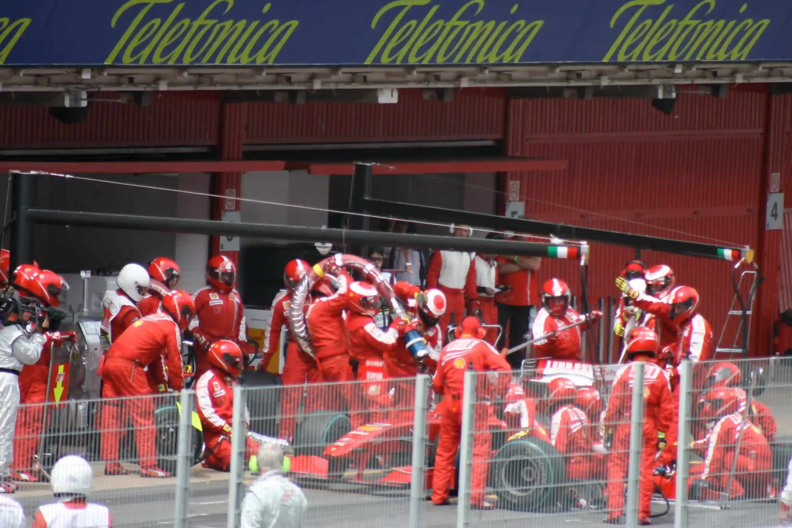 Ferrari Formula 1 pit crew servicing Felipe Massa during the 2009 Spanish Grand Prix