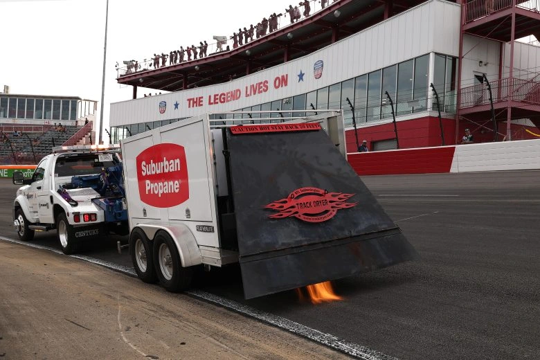 Jet dryers prepare North Wilkesboro Speedway for the delayed Cup practice session