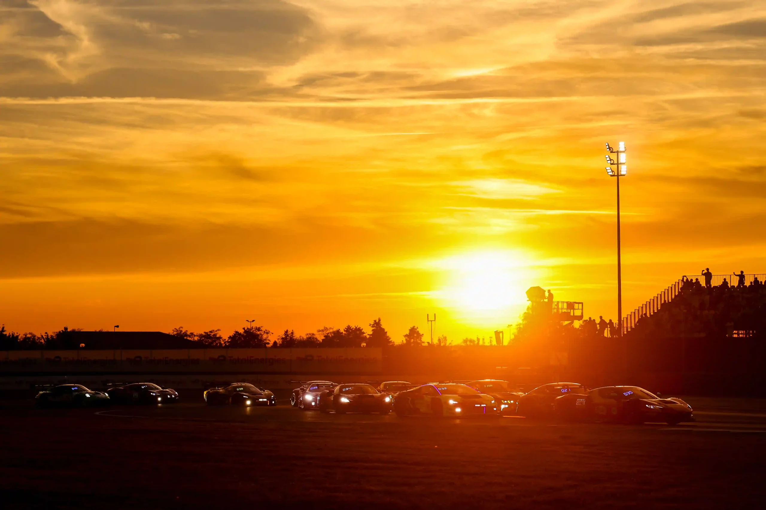 The 2026 Magny-Cours GT World Challenge Europe field approaching the start of the night race
