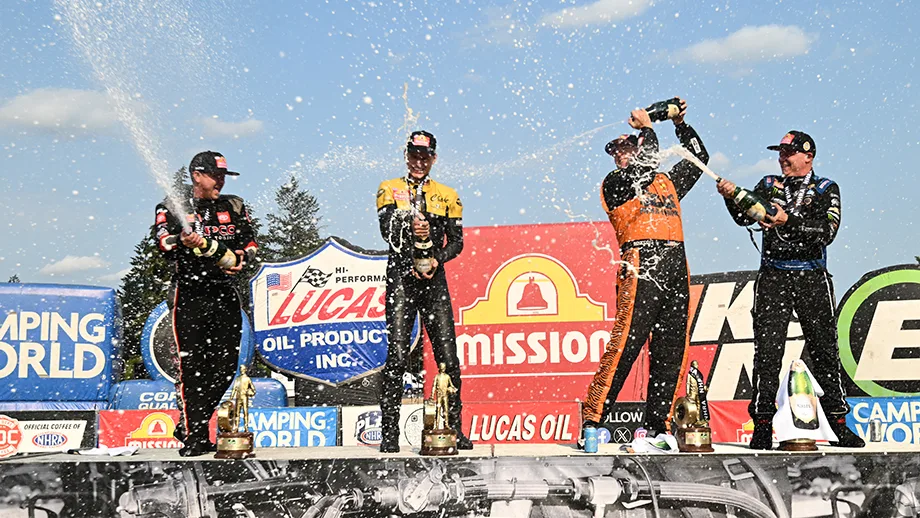 Archival Pacific Raceways winner-stage scene from an earlier Northwest Nationals