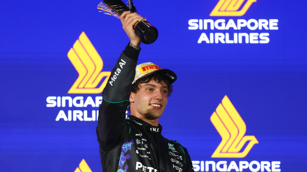 Kimi Antonelli celebrating third place on the podium at the 2026 Singapore Grand Prix